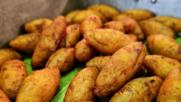 Unnakaya (a sweet banana and egg stuffed pastry)